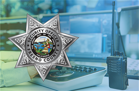 County security badge with command center